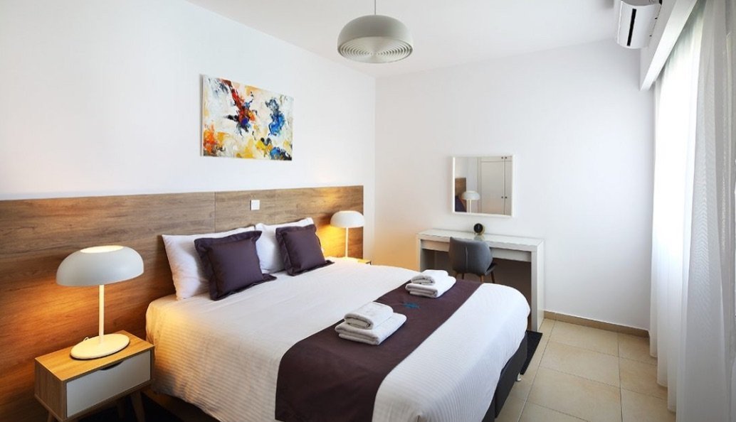 Modern in design, this two bedroom luxury penthouse is located on the 4th floor of building 12. The highlight is the large partially covered terrace w
