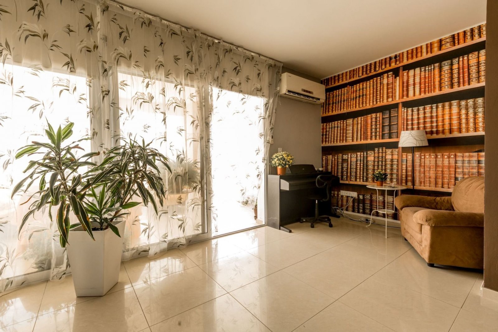 For sale is a spacious Top Floor three Bedroom Resale apartment located in the vibrant center of Paphos. This top-floor residence offers an internal s
