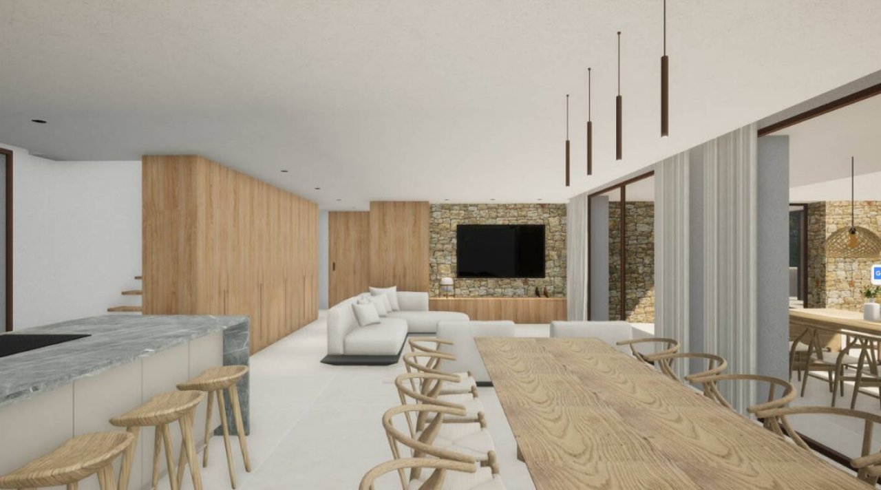 Offene Wohnarchitektur: Nahtlose Verschmelzung von Kochen, Essen und Wohnen mit eleganter Natursteinakzentuierung Offene Wohnarchitektur: Nahtlose Verschmelzung von Kochen, Essen und Wohnen mit eleganter Natursteinakzentuierung