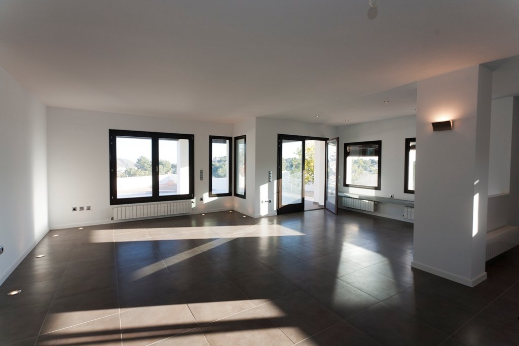 Bright living area with elegant panoramic windows and modern layout Bright living area with elegant panoramic windows and modern layout