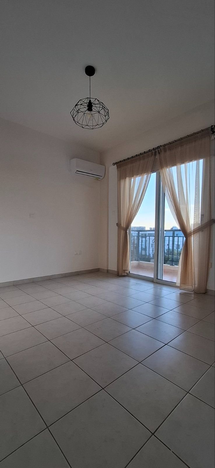 For sale is a well-maintained one-bedroom, one-bathroom apartment in Geroskipou. This resale property is situated on the top floor of a charming block