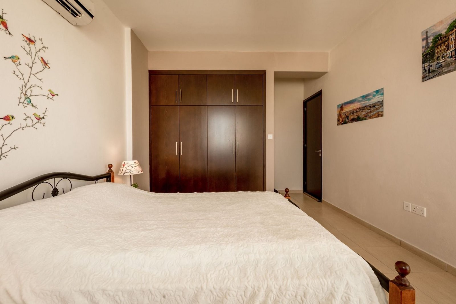For sale is a spacious Top Floor three Bedroom Resale apartment located in the vibrant center of Paphos. This top-floor residence offers an internal s