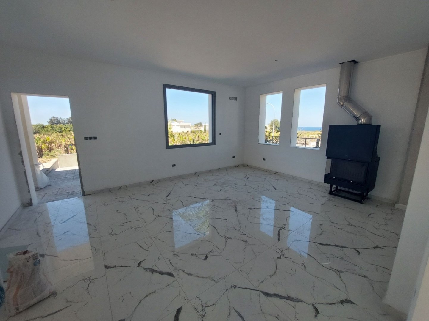 Ready For Delivery Brand New Modern Detached Villa in Pegia Agios Georgios.
The property includes a provision for Underfloor Heating, a fireplace,
