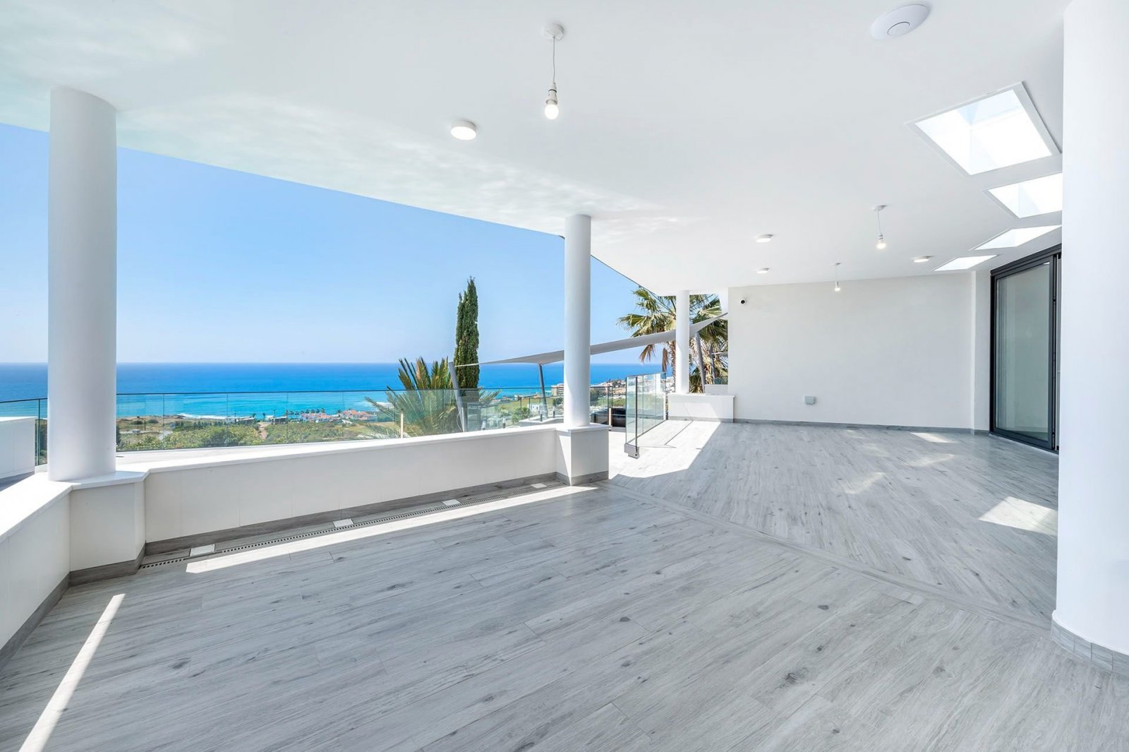 Luxury bungalow for sale in Kissonerga, Paphos. 5 bedrooms, 3 bathrooms, panoramic sea views, jacuzzi, private pool, landscaped gardens, close to Cora