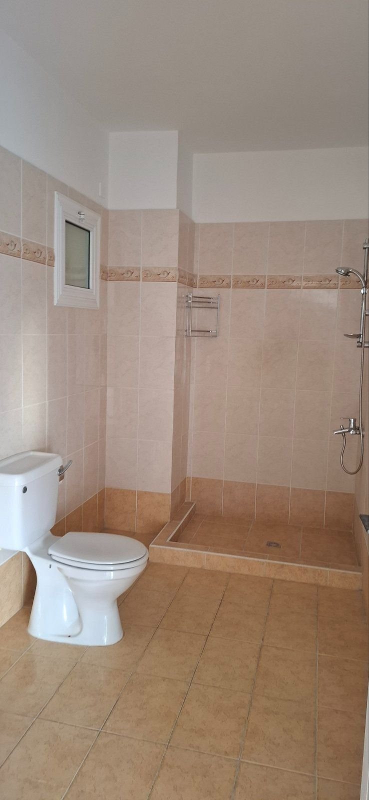 For sale is a well-maintained one-bedroom, one-bathroom apartment in Geroskipou. This resale property is situated on the top floor of a charming block
