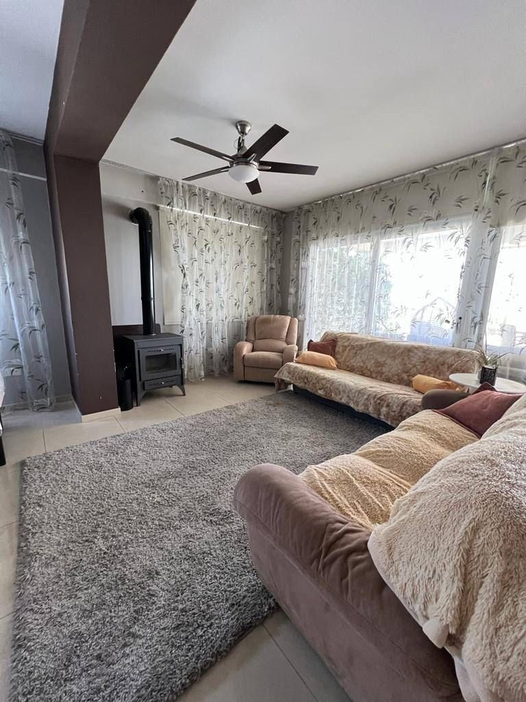 For sale is a spacious Top Floor three Bedroom Resale apartment located in the vibrant center of Paphos. This top-floor residence offers an internal s
