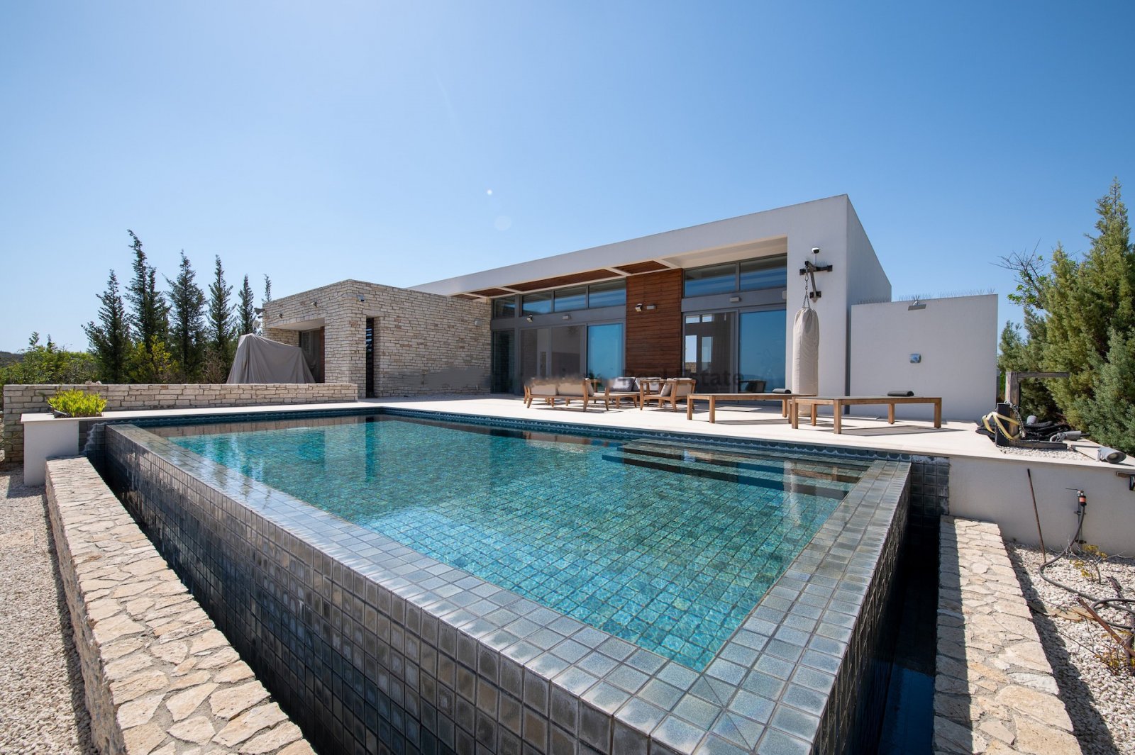 Resale Villa for sale, ready for delivery.
This elegant luxury villa for sale in Minthis Hills, Tsada, offers an exceptional opportunity to own a prem