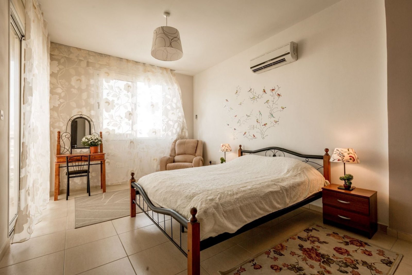 For sale is a spacious Top Floor three Bedroom Resale apartment located in the vibrant center of Paphos. This top-floor residence offers an internal s
