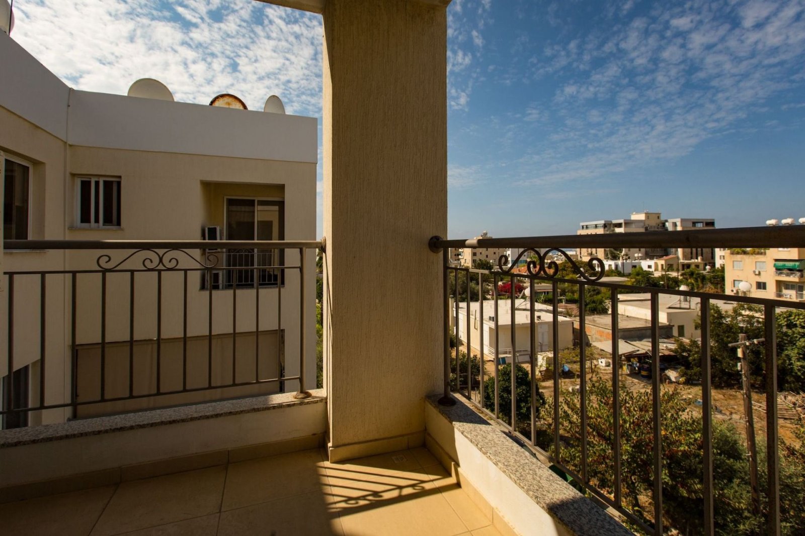 For sale is a spacious Top Floor three Bedroom Resale apartment located in the vibrant center of Paphos. This top-floor residence offers an internal s