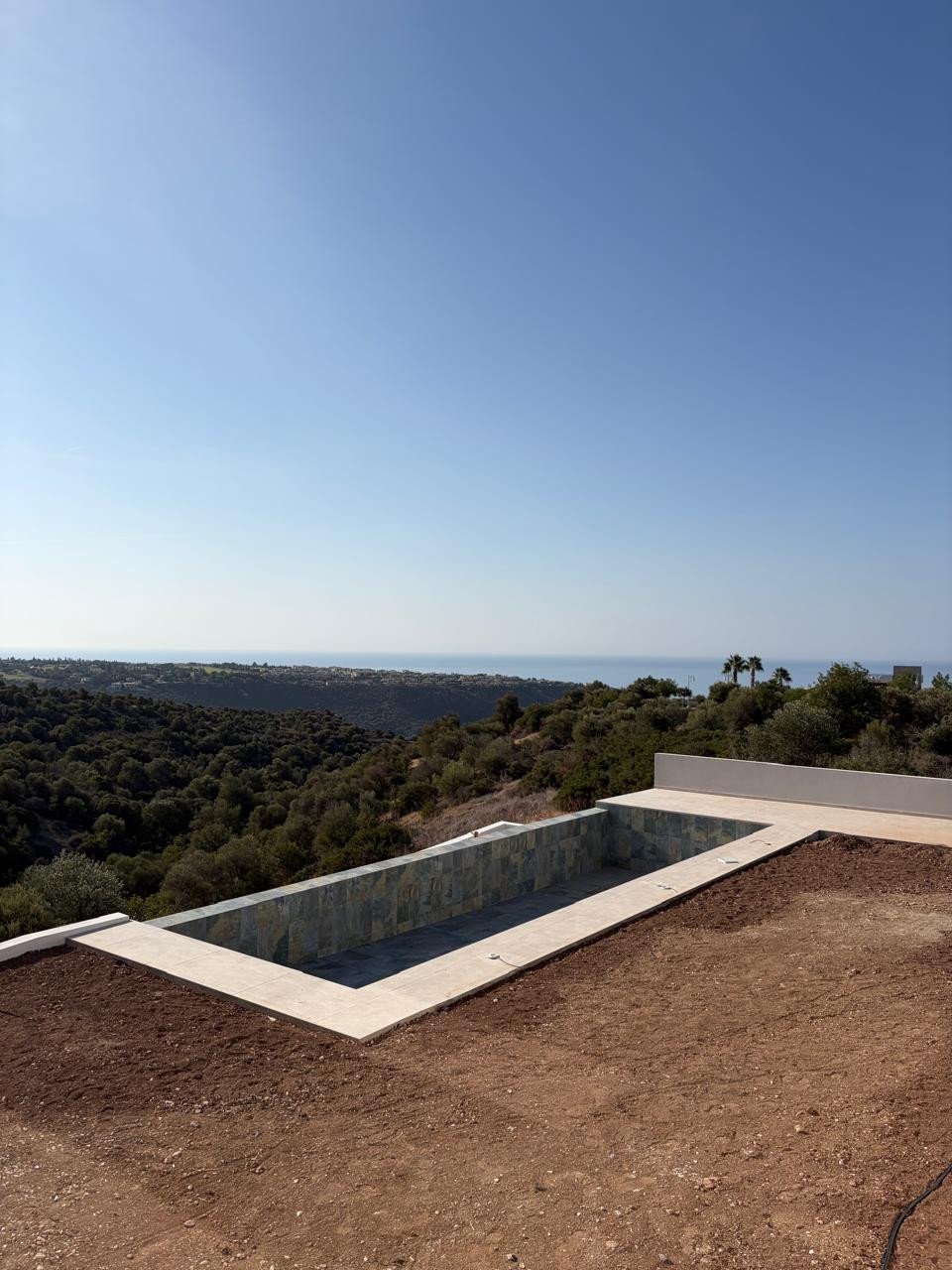 For sale is a stunning, modern bungalow located in the prestigious area of Kouklia - Aphrodite Hills. This key ready home offers spacious living on on