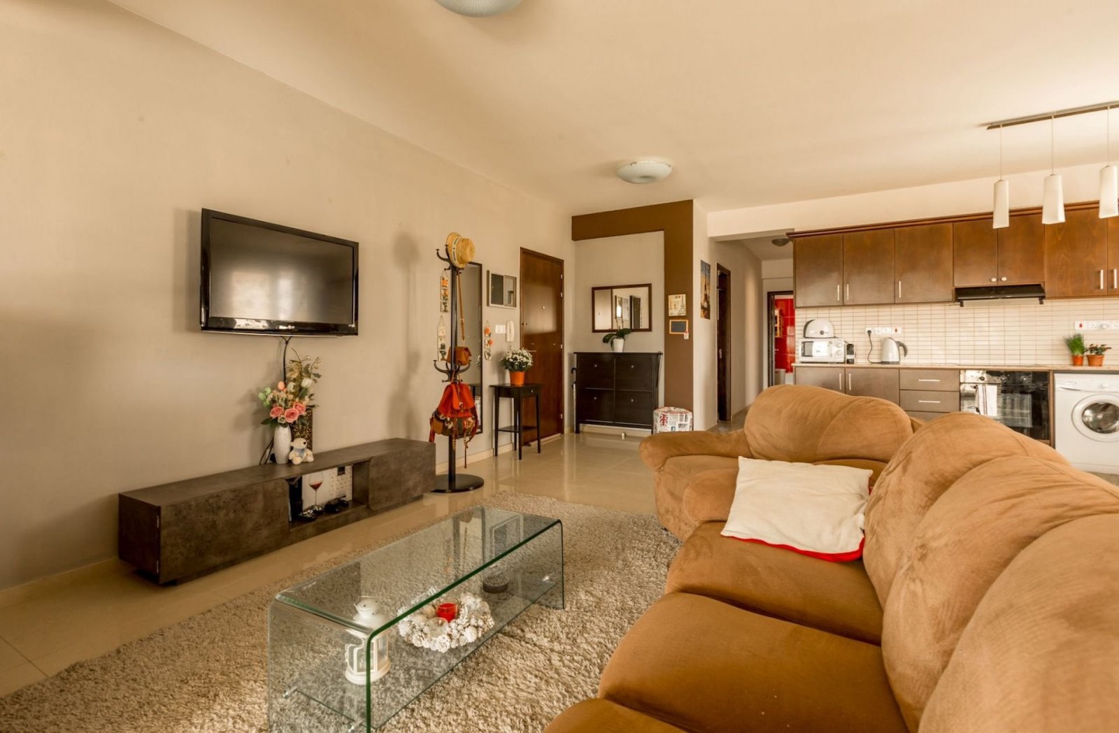 For sale is a spacious Top Floor three Bedroom Resale apartment located in the vibrant center of Paphos. This top-floor residence offers an internal s