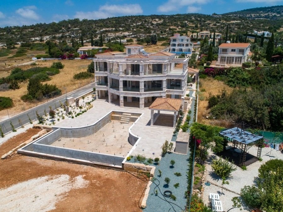For Sale Luxury Unique Mansion at the Akamas-Paphos Paradise Cove. A Magnificent and timeless Architectural Modern compound on a plot of 8,300 square