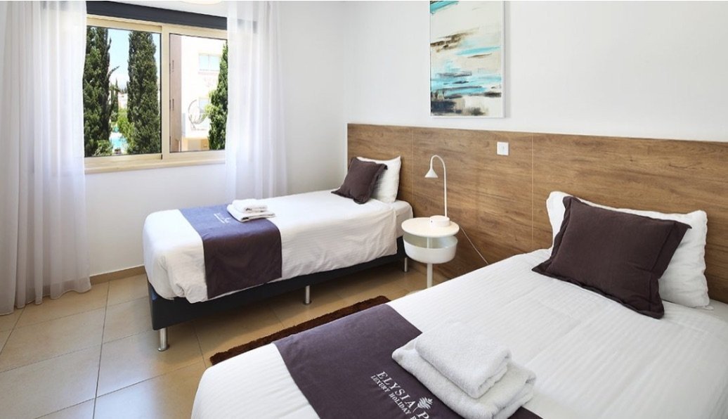 Beautifully finished and modern in style, this two bedroom townhouse features an open plan living/dining area & kitchen separated by the breakfast bar