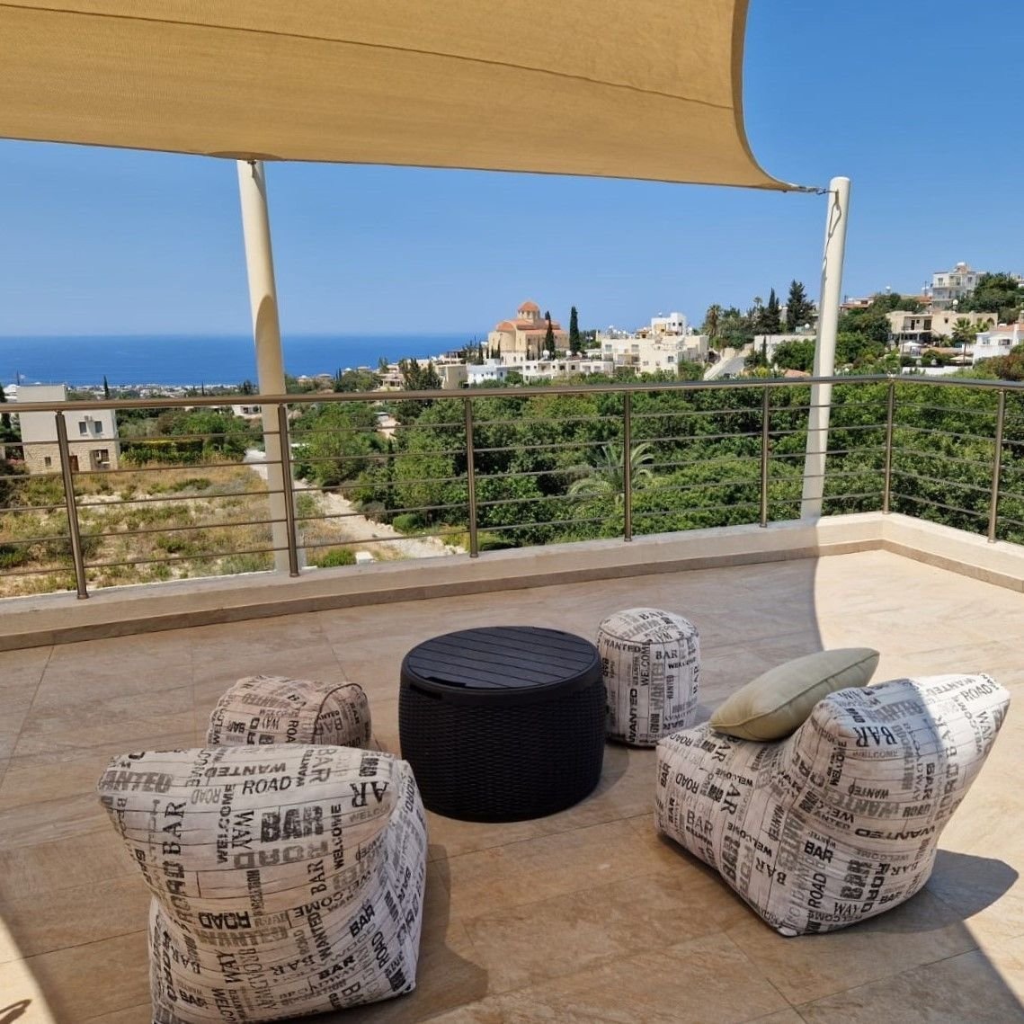 This villa is located in a quiet and picturesque area of Paphos in Tala Village. Tala village centre is a short walk away and offers a selection of ca