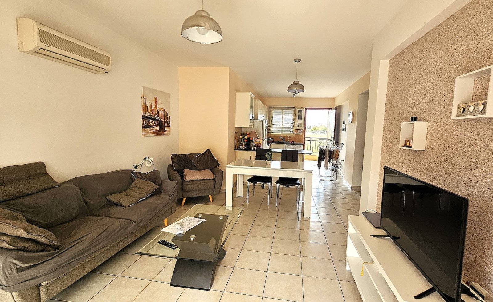 For sale is a modern 2-bedroom apartment located in the sought-after area of Kato Paphos, near the Tomb of the Kings Archeological Park and Venues San