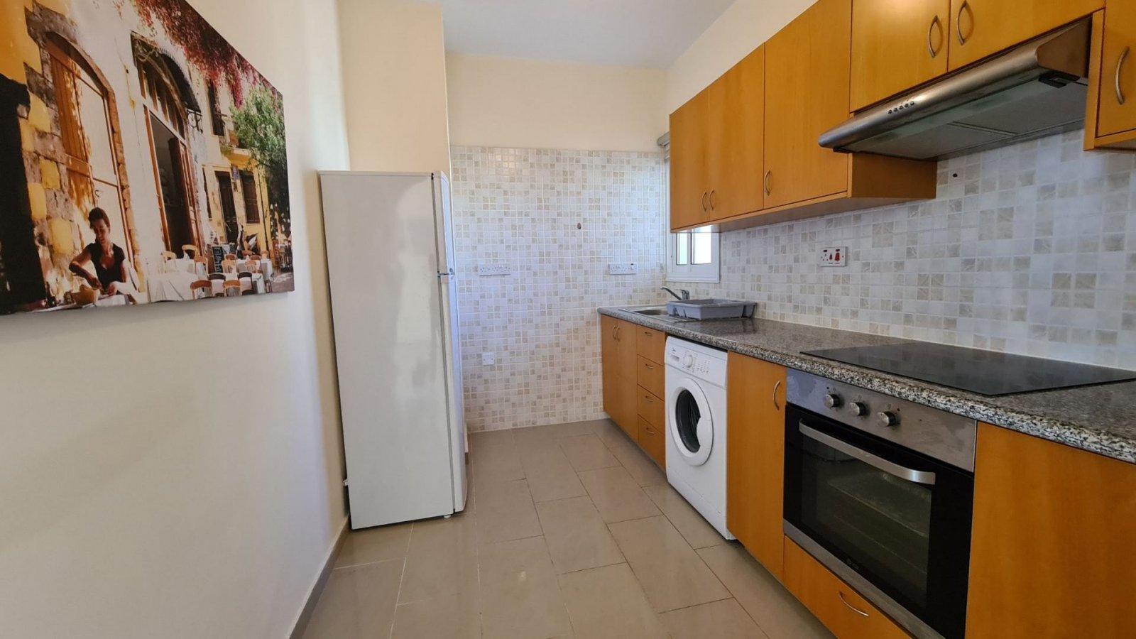 For Sale apartment on first floor near all amenities and the venues beach.